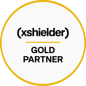 gold xshielder badge round